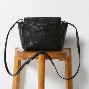 status anxiety “the ascendants” handbag